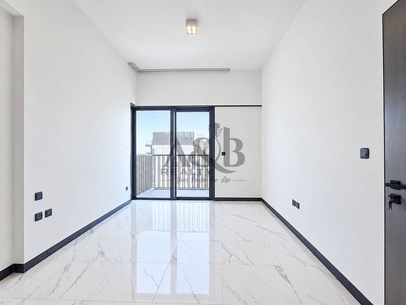 7 Minimalist Marble-Floored Room with Balcony Views. png