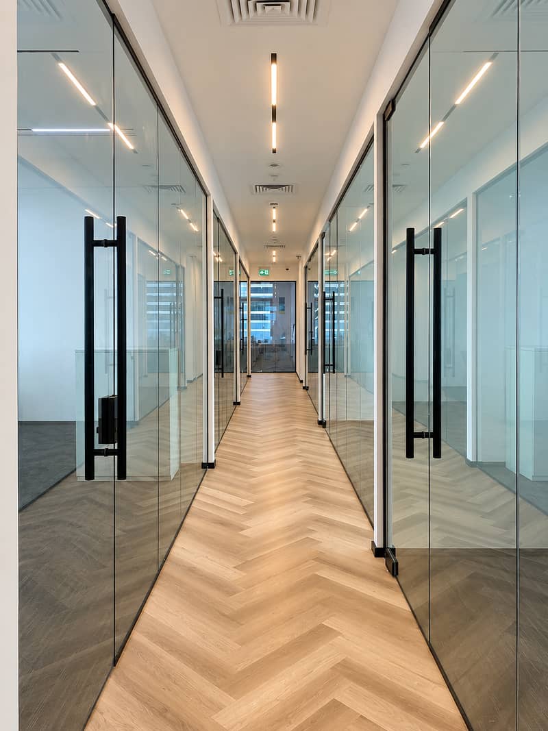 3 Symmetrical Glass Office Corridor. png