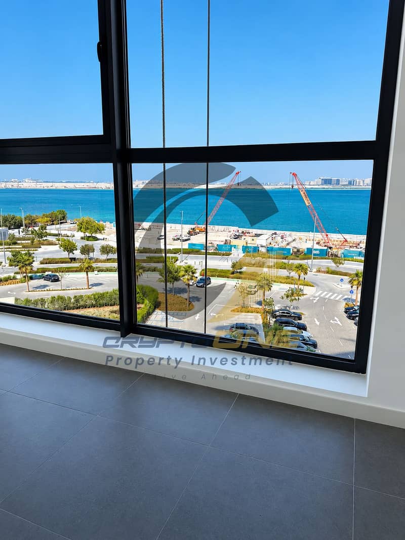 3 13_modern_coastal_view_through_black_frame_window. png