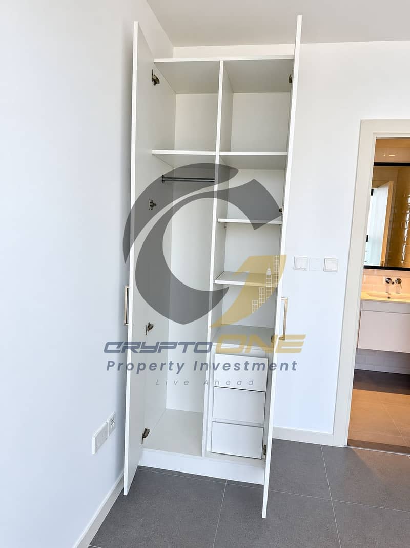 10 15_minimalist_white_wardrobe_and_bathroom_interior. png