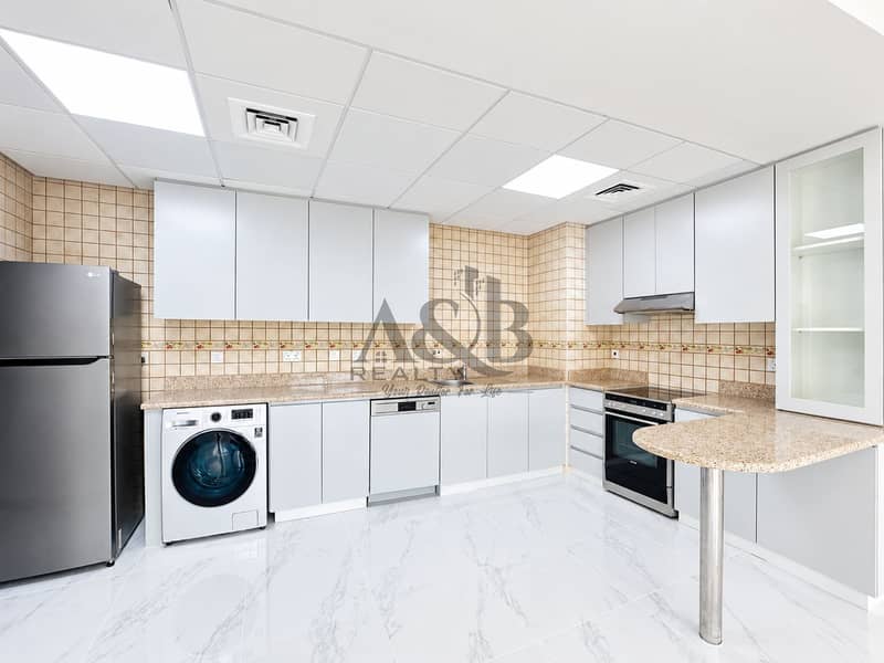 4 Bright Modern L-Shaped Kitchen Interior. png