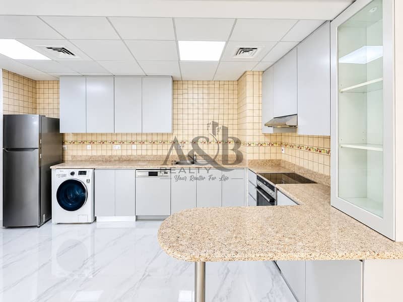 5 Bright Modern L-Shaped Kitchen. png