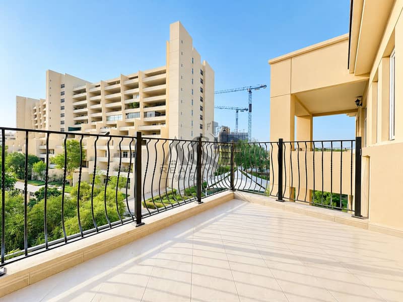 6 Sunny Balcony Overlooking Modern Apartments. png