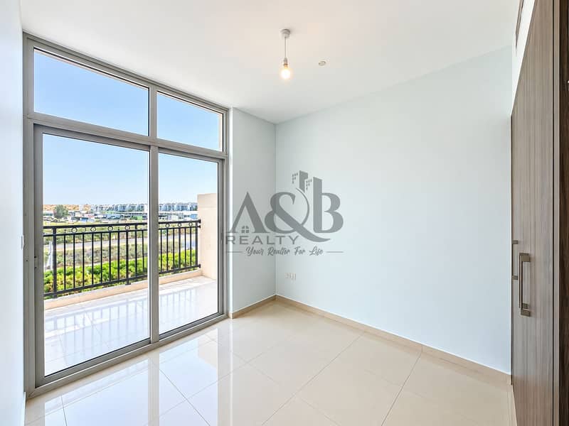12 Bright Minimalist Room with Balcony View. png