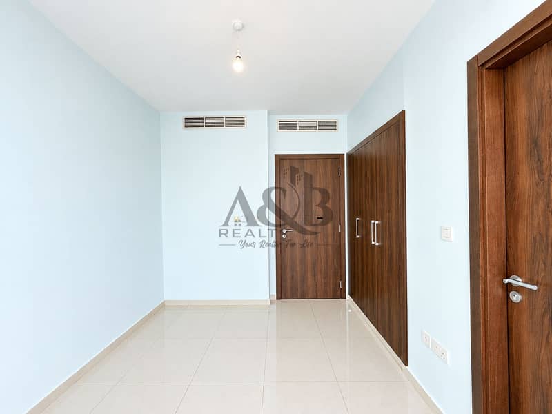 13 Bright Minimalist Hallway with Wooden Doors. png