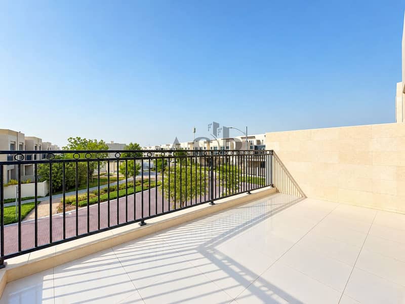 15 Sunny Modern Balcony Overlooking Villas. png