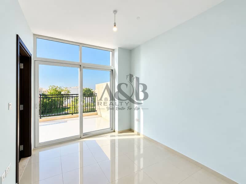 19 Sunlit Minimalist Room with Balcony. png