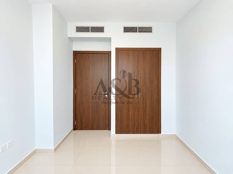 25 Minimalist Entryway with Wood Door and Wardrobe. png