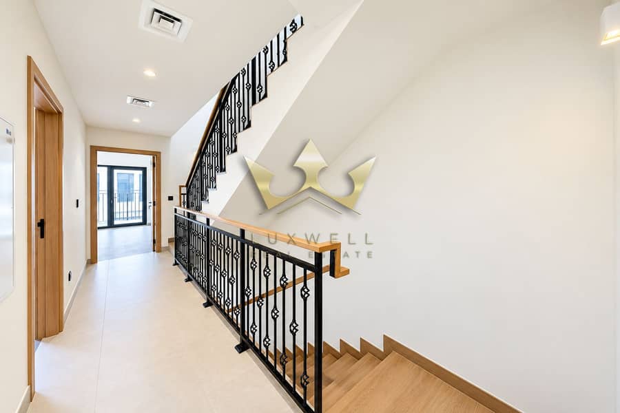 7 Modern Hallway with Wood Staircase. png