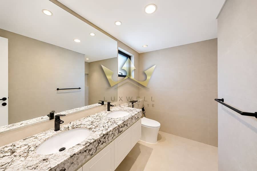 11 Modern Minimalist Double-Vanity Bathroom. png