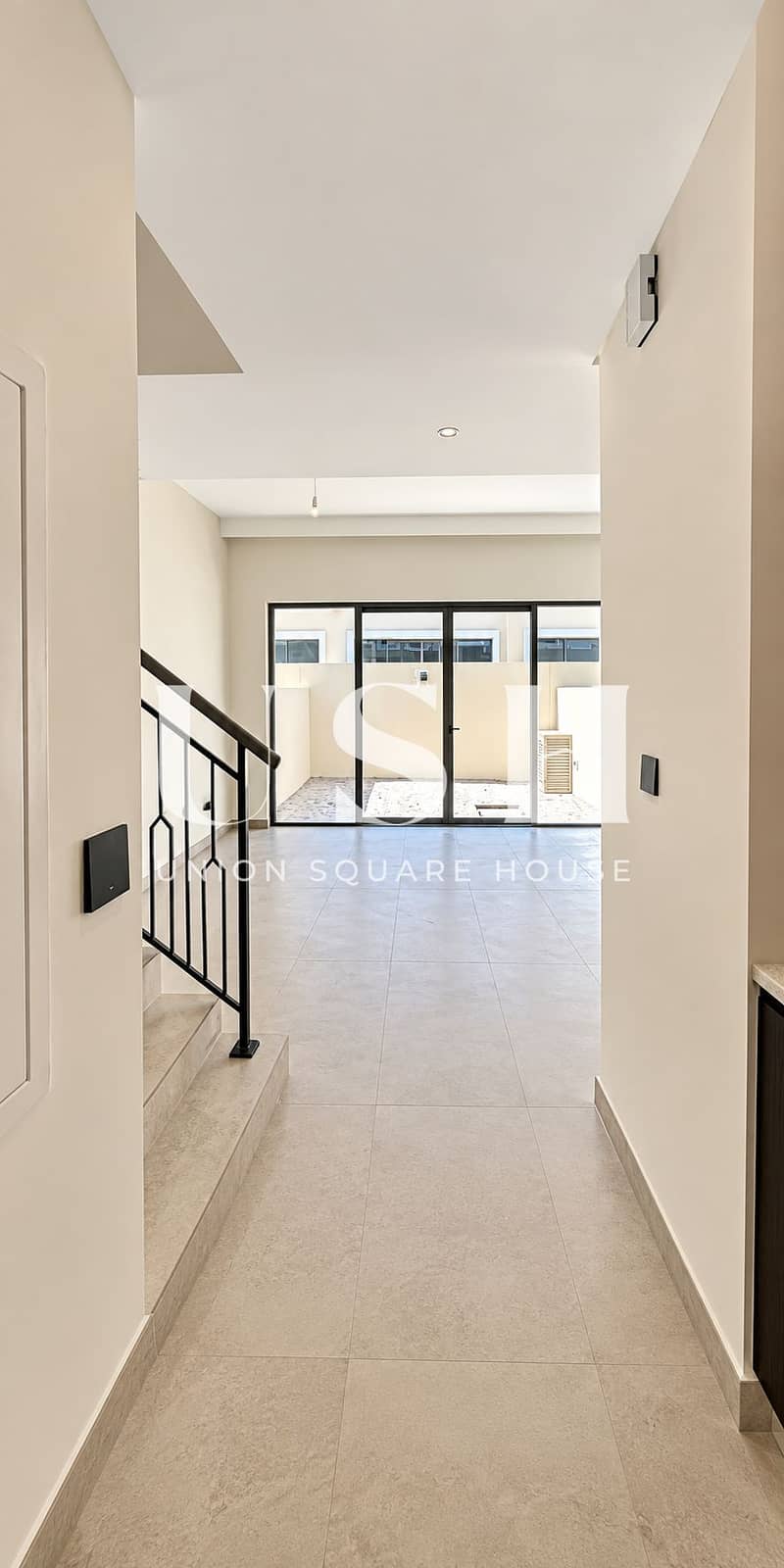 2 Modern Minimalist Hallway to Sunlit Patio (1). png