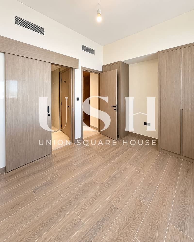 3 Minimalist Warm-Toned Interior with Open Doors (1). png
