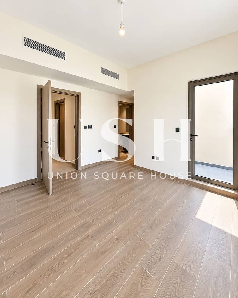 5 Bright Minimalist Interior with Wood-Look Flooring. png