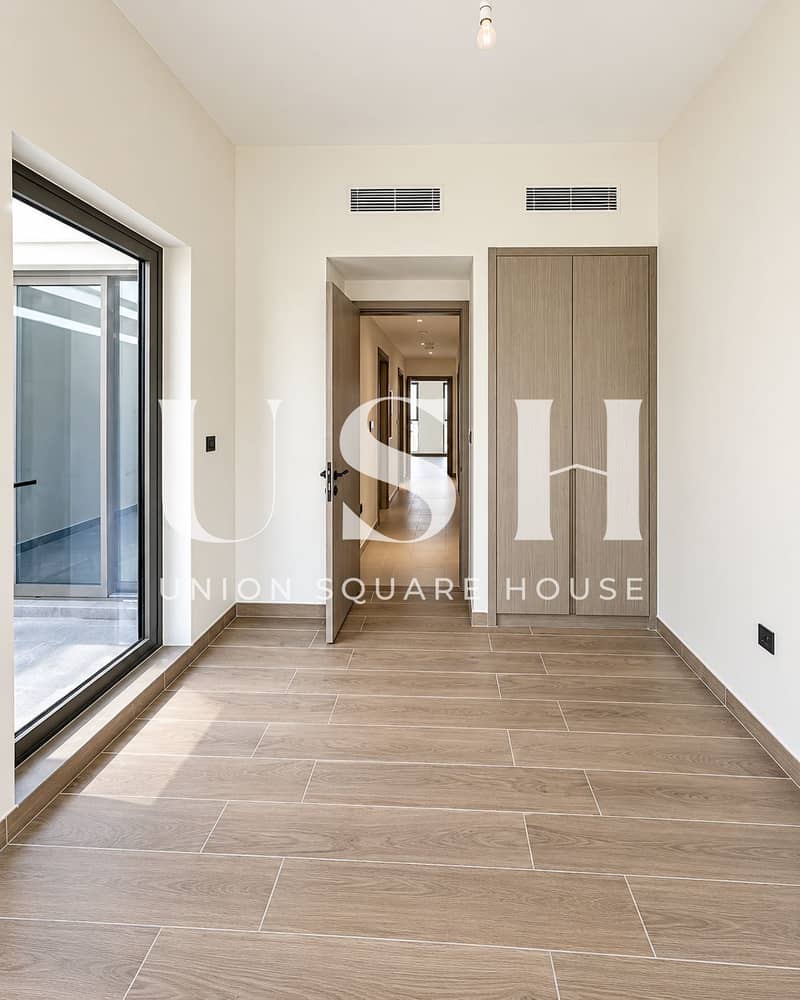 6 Minimalist Bedroom with Hallway Perspective. png