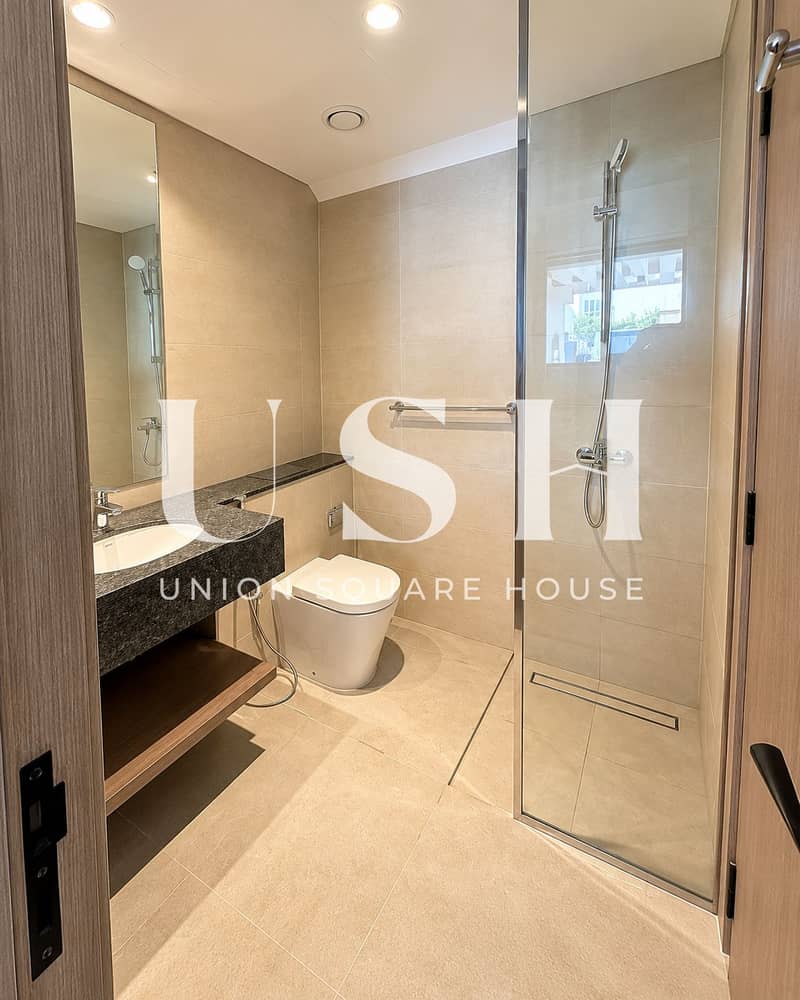 12 Modern Beige-Tiled Bathroom Interior (1). png