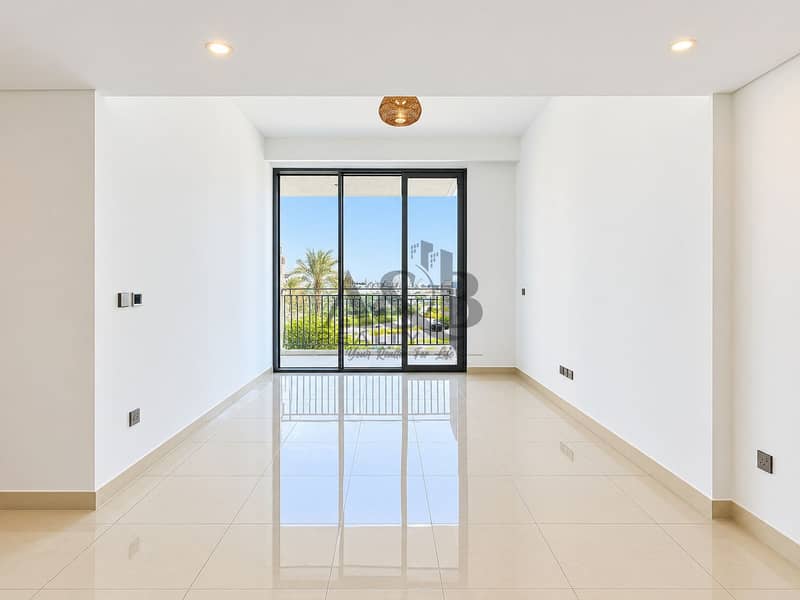 2 Bright Minimalist Living Room with Balcony Views. png