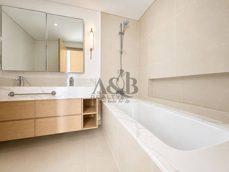 13 Minimalist Beige Marble Bathroom. png