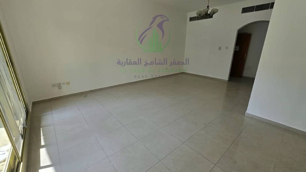 13 apartment-for-rent-2-bedroom-altaawn-alsharqh-living-room-03. jpg