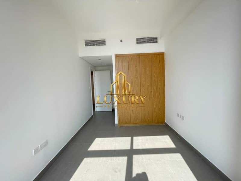 9 Spacious 1-Bedroom Apartment with Pool View & 2 Bathrooms for Yearly Rent | 44999
