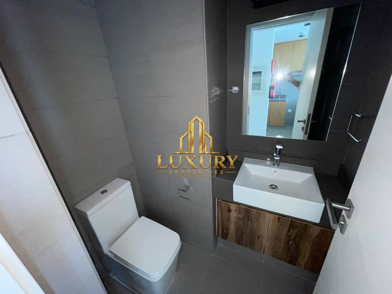 13 Spacious 1-Bedroom Apartment with Pool View & 2 Bathrooms for Yearly Rent | 44999