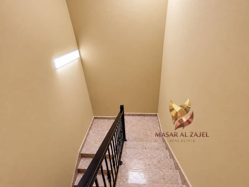 37 Escalier minimaliste en terrazzo beige. png