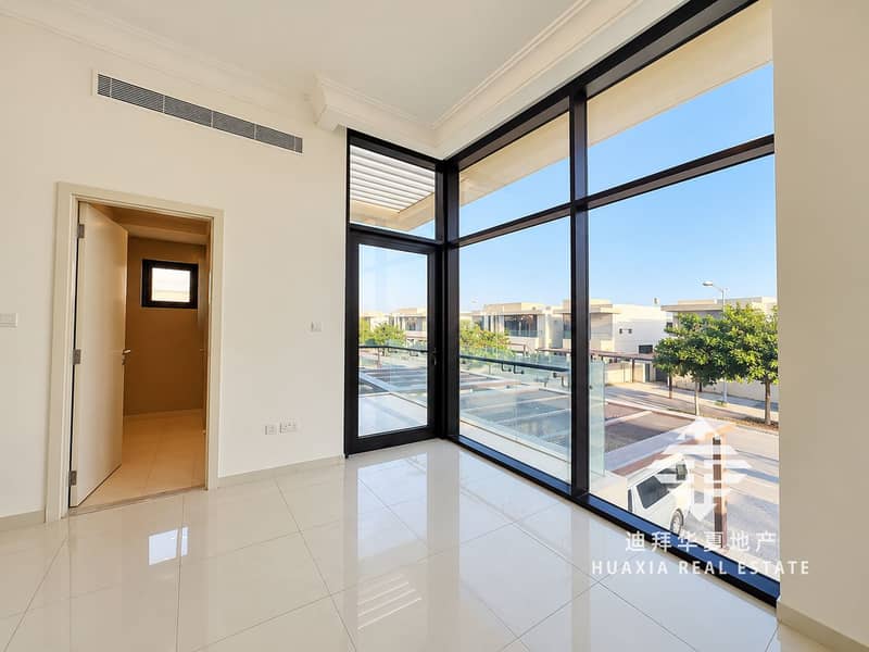 9 Sunlit Minimalist Room with Corner Windows. png