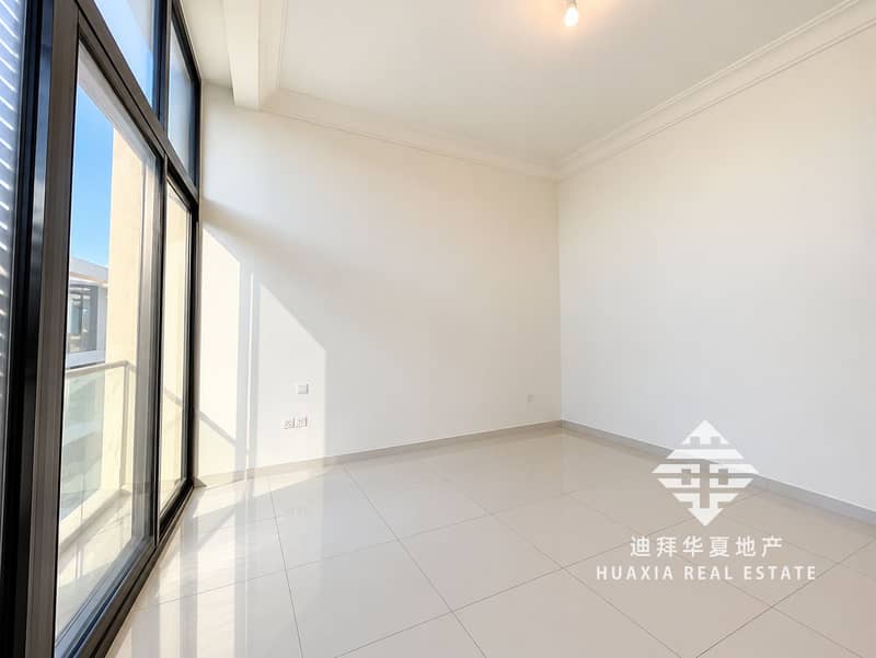 13 Bright Minimalist Room with Reflective Floors. png