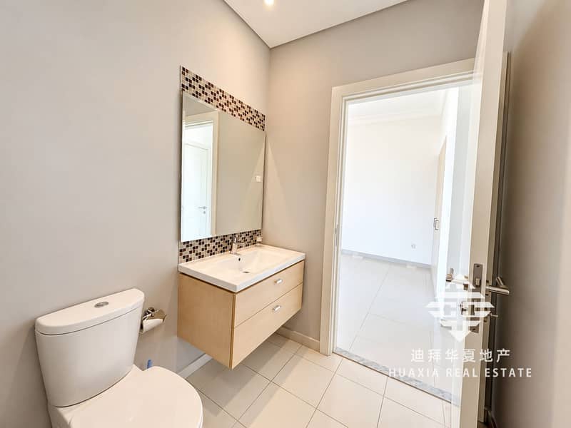15 Bright Modern Bathroom with Mosaic Mirror. png