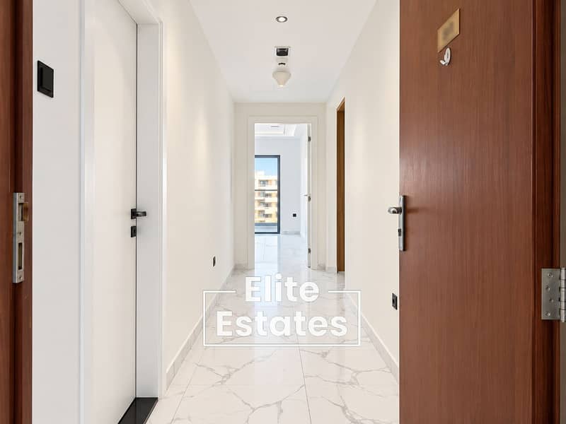 2 Modern Marble Hallway with Open Entry Door. png