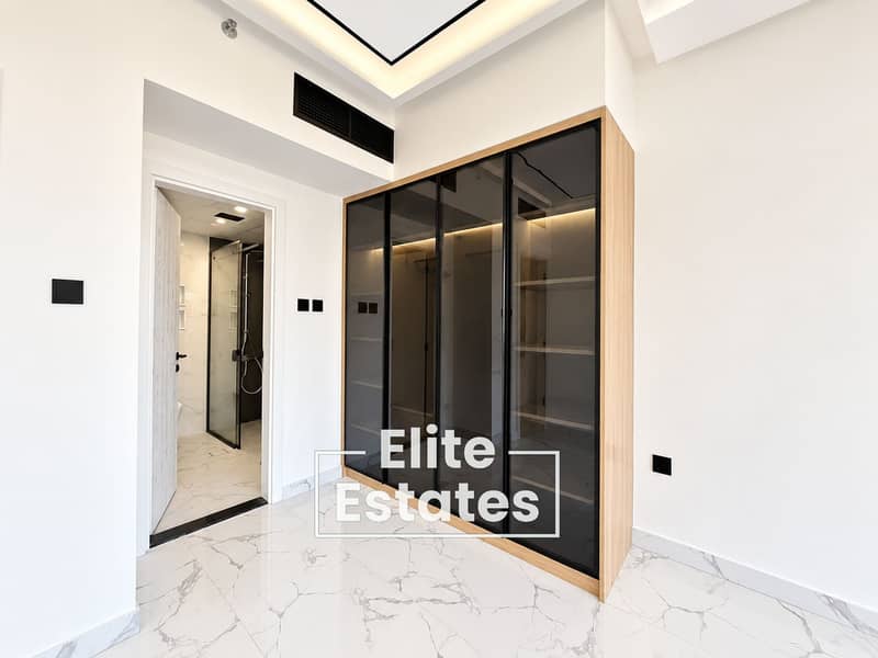 8 Minimalist Wardrobe and Marble Bathroom Entrance (1). png