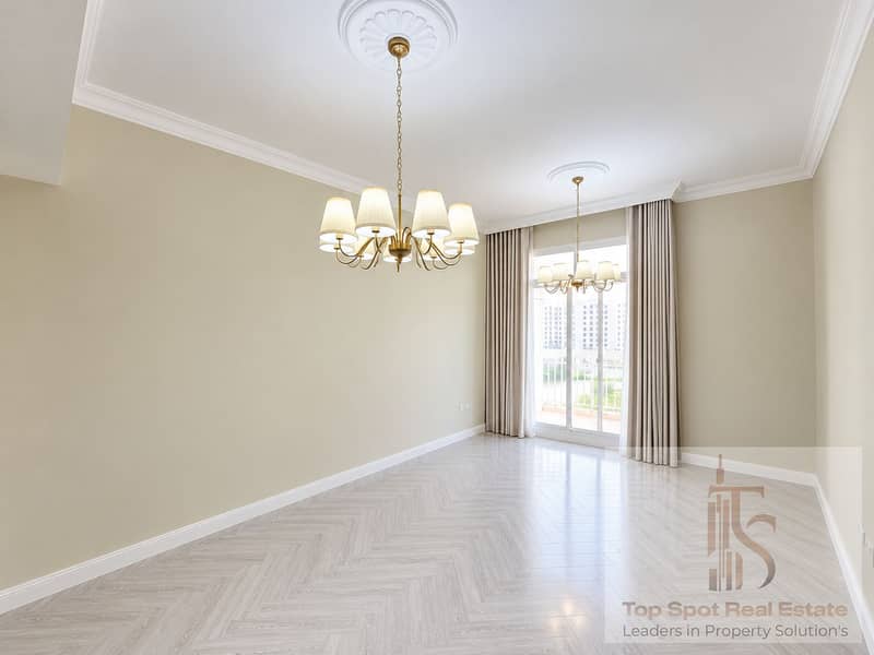 2 Elegant Empty Room with Twin Chandeliers. png