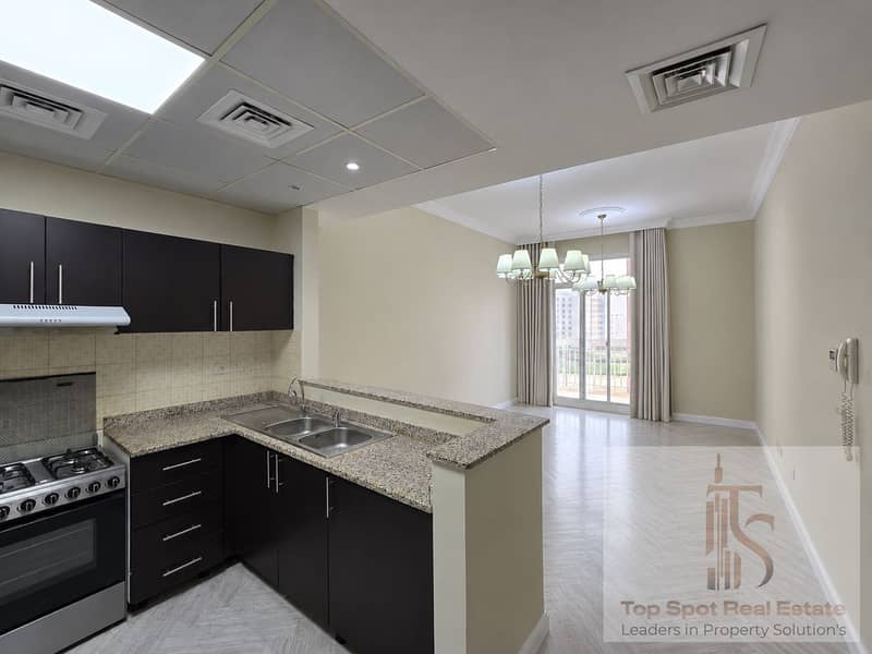 3 Clean Modern Open-Plan Kitchen and Living Area. png