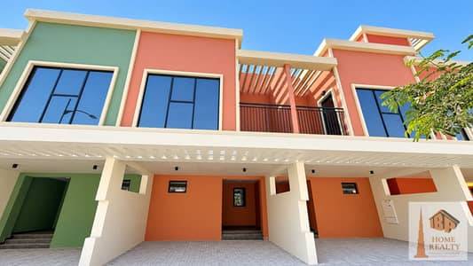 3 Camere Townhouse in affitto a DAMAC Lagoons, Dubai - Polished pastel home exterior. png