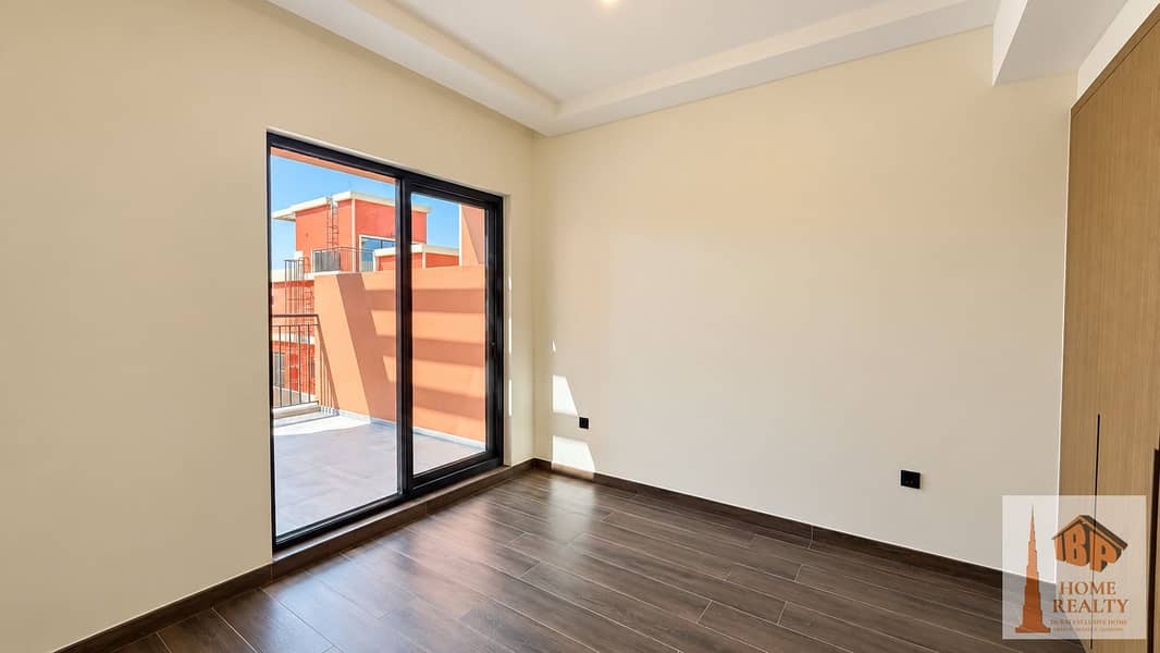 6 Sunlit Empty Bedroom with Balcony View. png