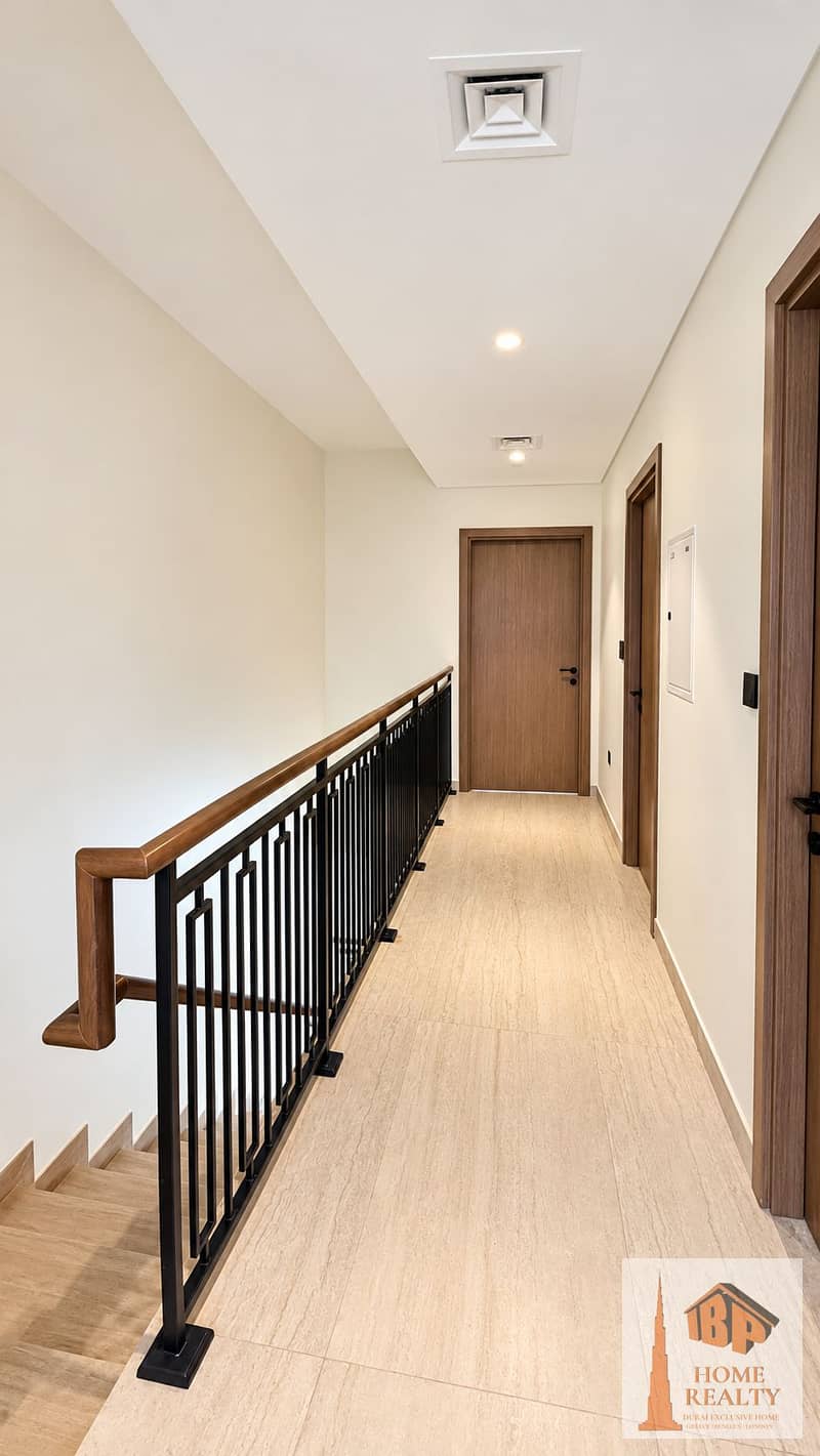 12 Bright upstairs hallway and staircase landing. png