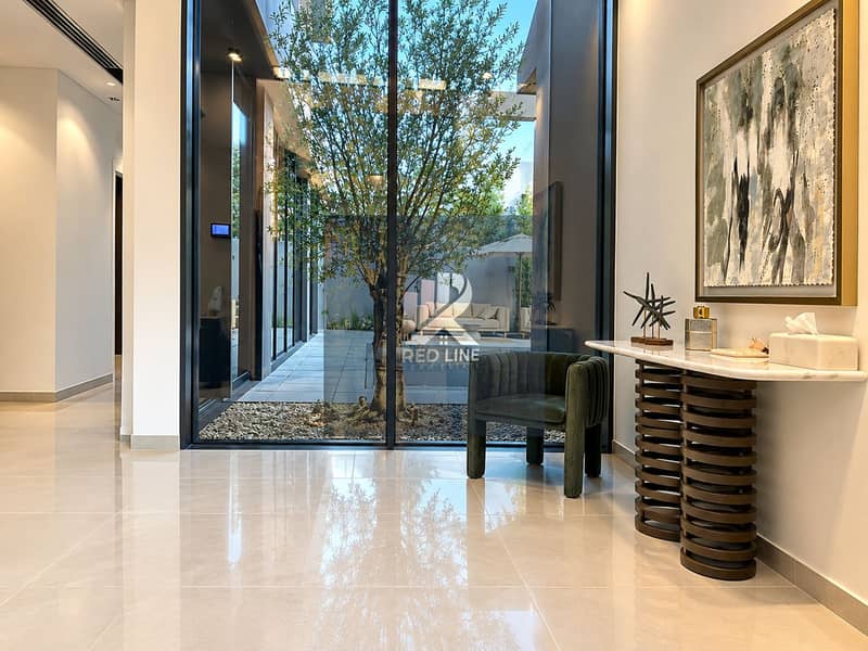 4 Modern Foyer with Courtyard View. png