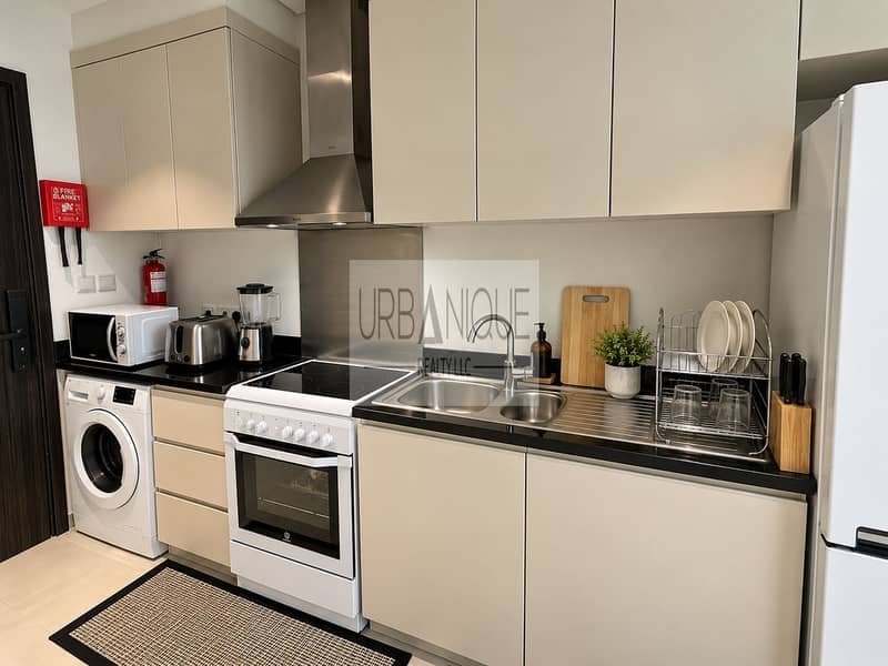3 Tidy Modern Kitchen with Stainless Accents. png