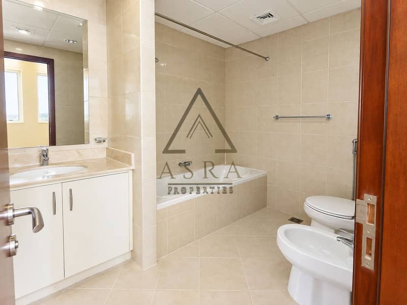 5 Modern Beige-Tiled Hotel Bathroom. png