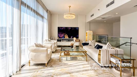 2 habitaciones Apartamento para en Alquiler en Jumeirah Village Circle (JVC), Dubai - Sunlit Luxury Living Room Retreat. png