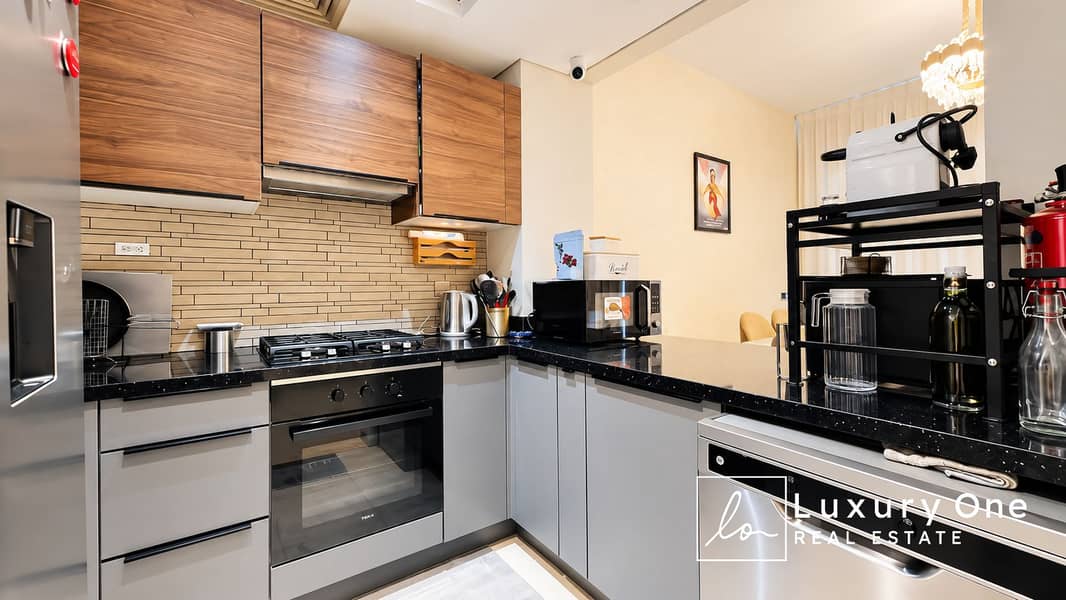 9 Warm Modern Galley Kitchen. png