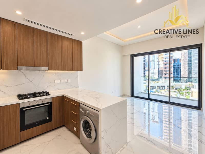 2 Bright Marble Kitchen with Urban Balcony View. png
