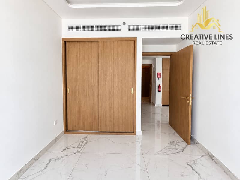4 Bright Minimalist Bedroom with Wooden Wardrobe. png