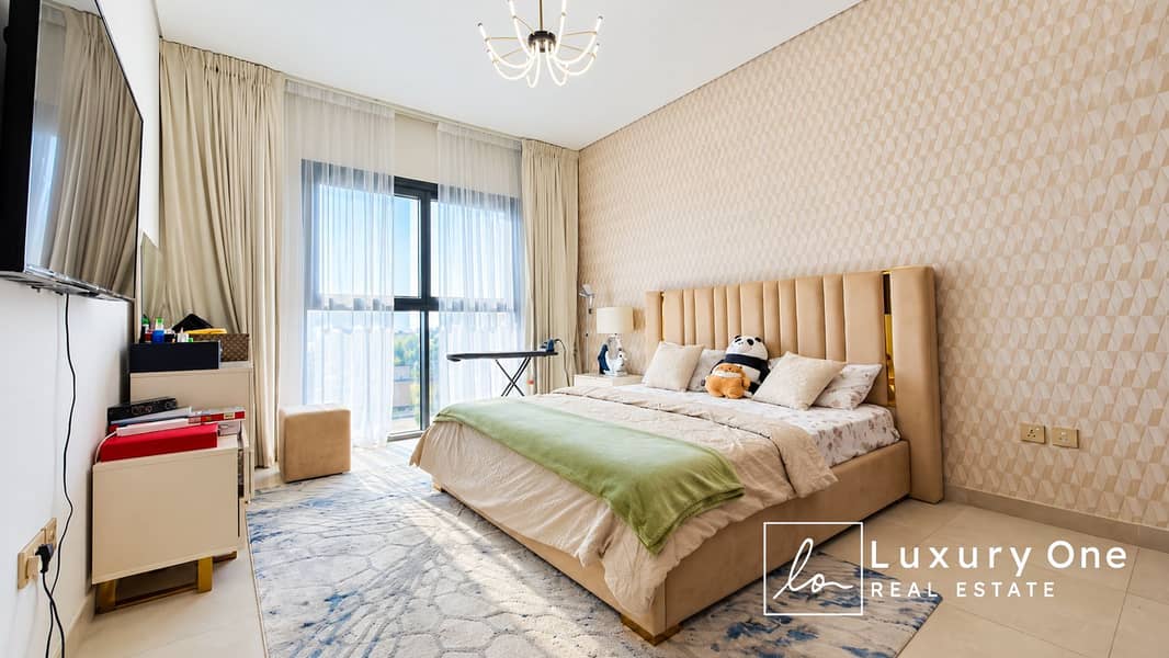 5 Bright Modern Bedroom with Plush Accents. png