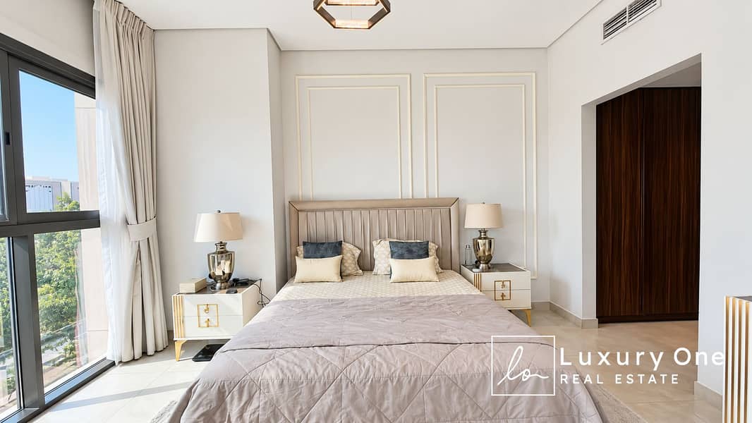 8 Bright Symmetrical Modern Bedroom. png