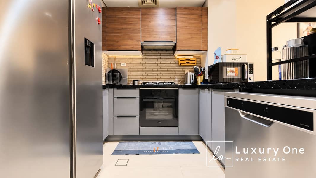 10 Bright Modern Kitchen with Warm Wood Cabinets. png