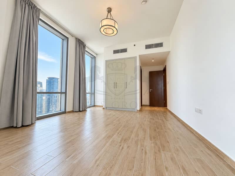 2 Bright Minimalist Room with City View. png