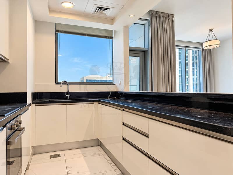 4 Bright Modern Apartment Kitchen. png