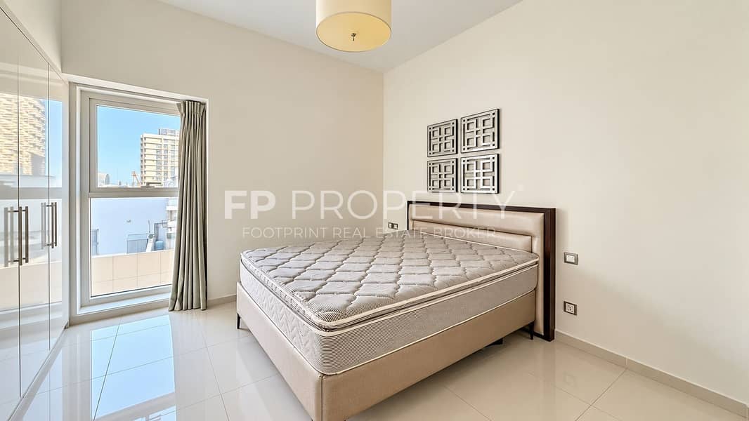 5 Bright Minimalist Bedroom with City View. png