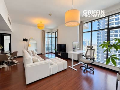 1 habitación Apartamento para en Alquiler en Jumeirah Lake Towers (JLT), Dubai - Bright, decluttered apartment living room-1. png