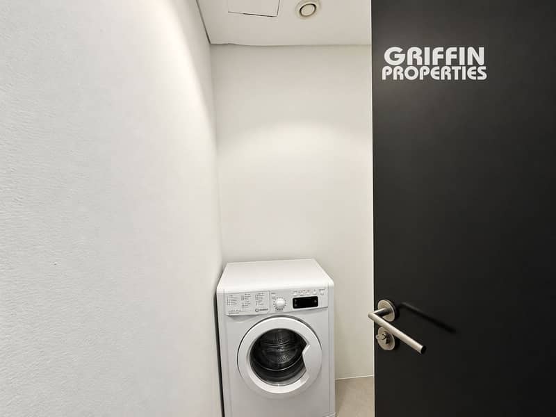 11 Bright, clutter-free laundry room-1. png